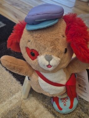 Hallmark Animatronic Puppy with Red Ears and Blue Hat Accents